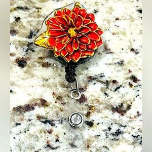 Flower badge reel. Badge pull.